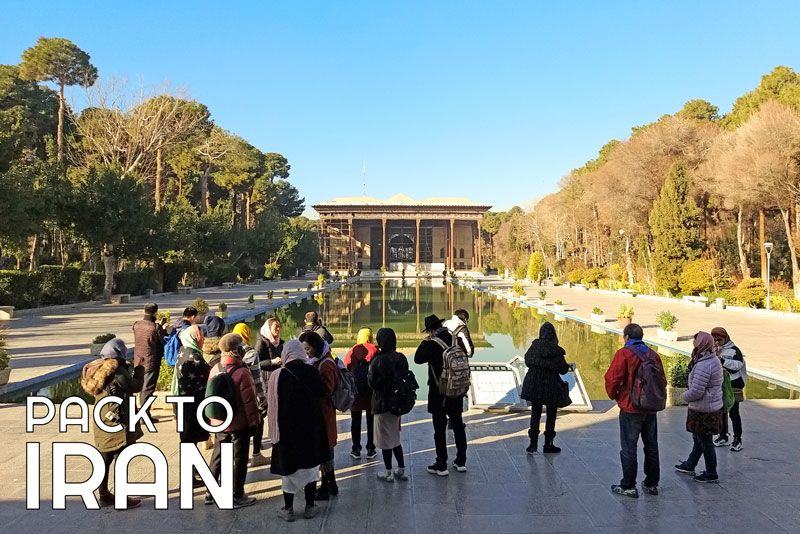 travelers visiting Chehel Sotun Garden - Isfahan