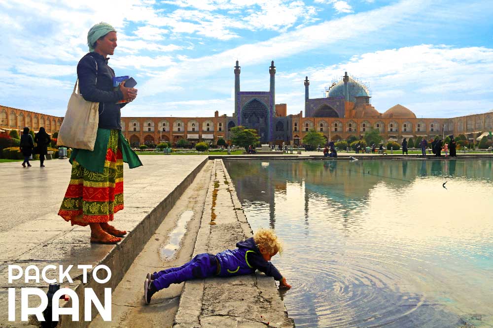 A woman and her son in Naqsh-e Jahan Square - Isfahan, Iran